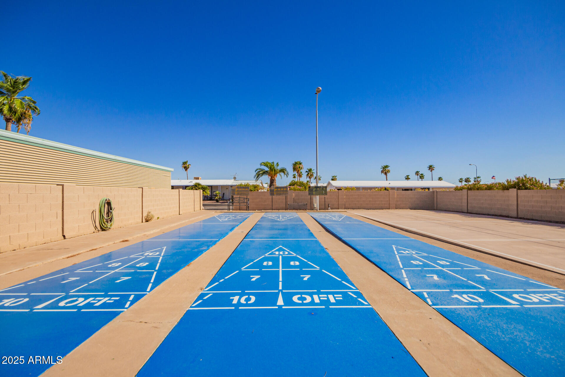 834 South Meridian Road, Unit 116 Apache Junction, AZ 85120 - Photo 37 of 42 a view of swimming pool with outdoor seating