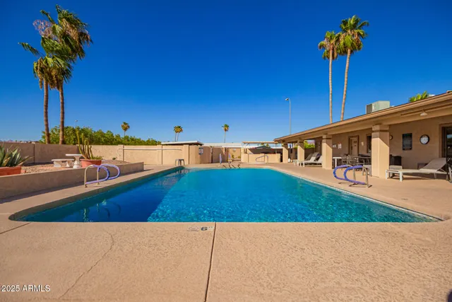 a front view of a house with swimming pool