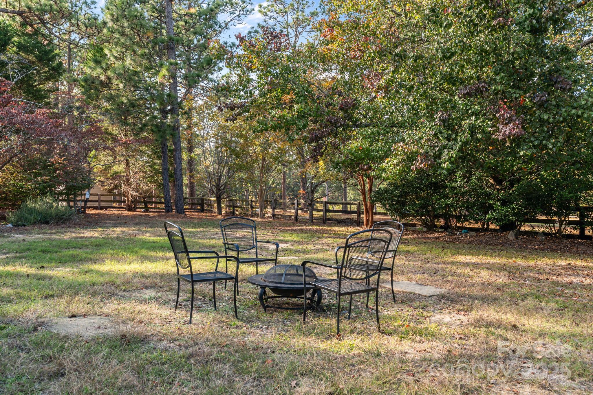 2000 Airport Road Carthage, NC 28327 - Photo 11 of 45 a view of swimming pool with table and chairs