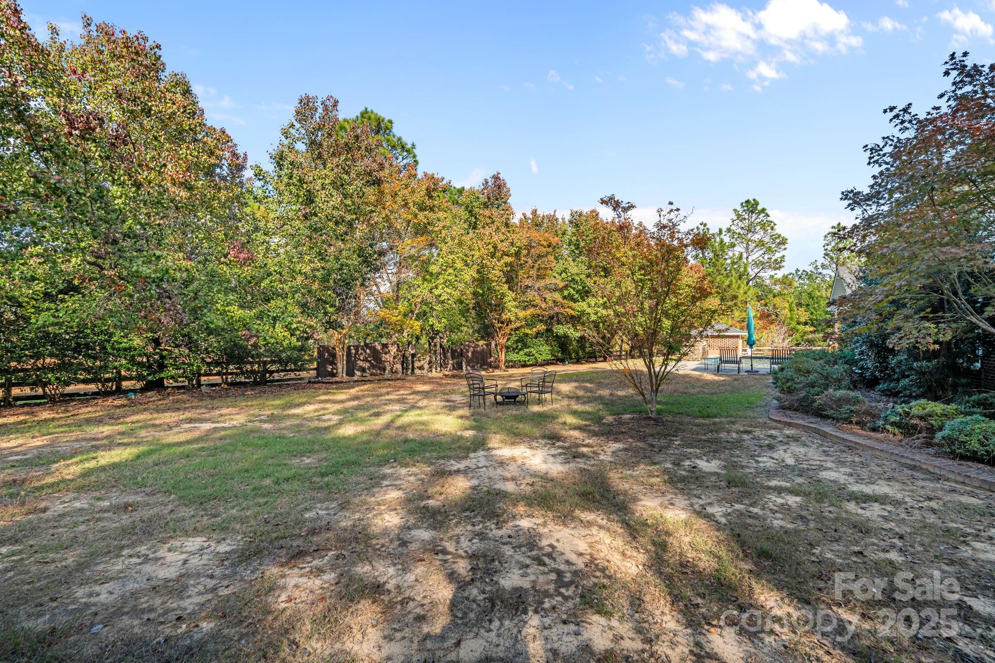 2000 Airport Road Carthage, NC 28327 - Photo 12 of 45 a view of a field with trees in the background