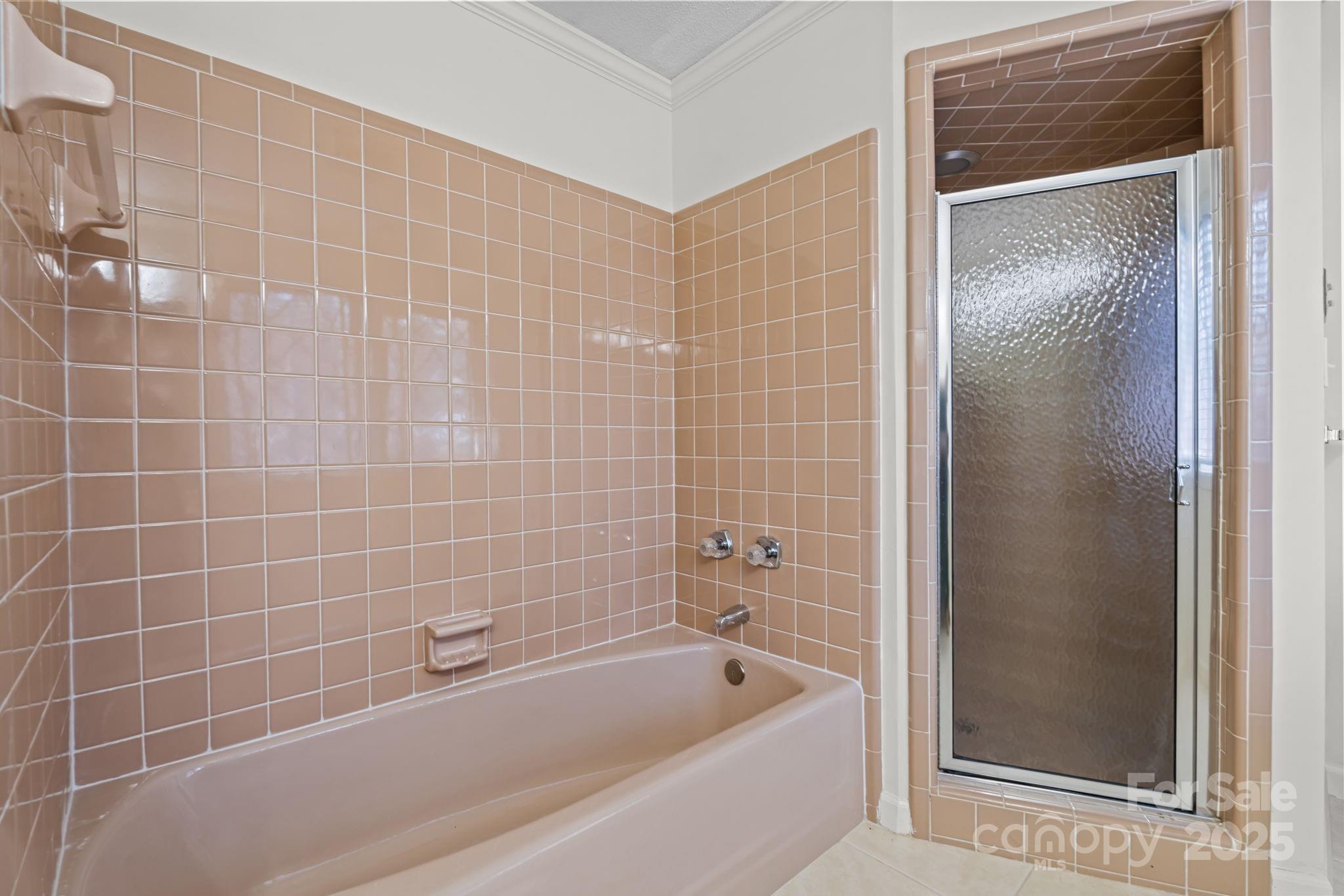 2000 Airport Road Carthage, NC 28327 - Photo 22 of 45 a bathroom with a bathtub and a shower