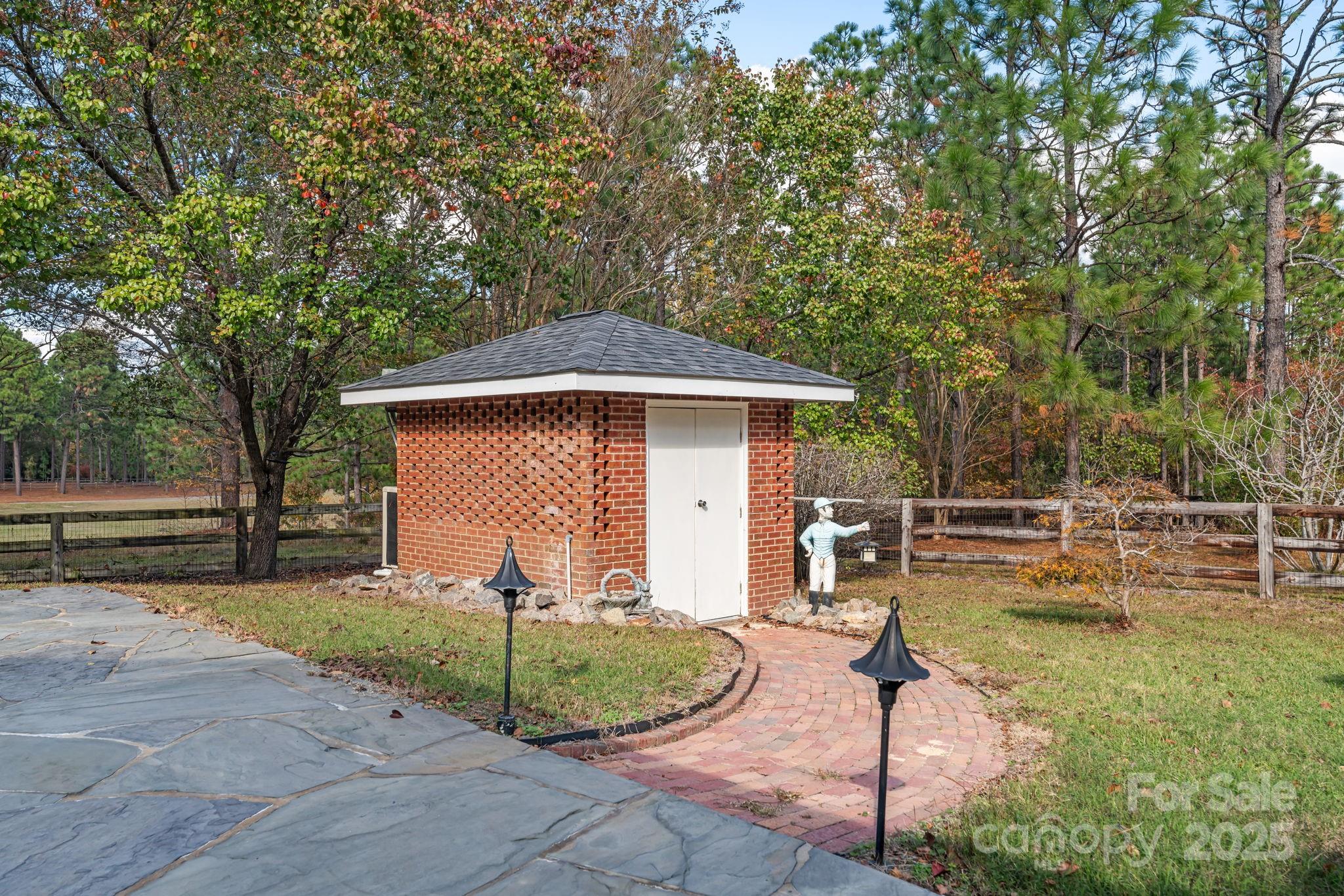 2000 Airport Road Carthage, NC 28327 - Photo 5 of 45 a view of a house with backyard and sitting area