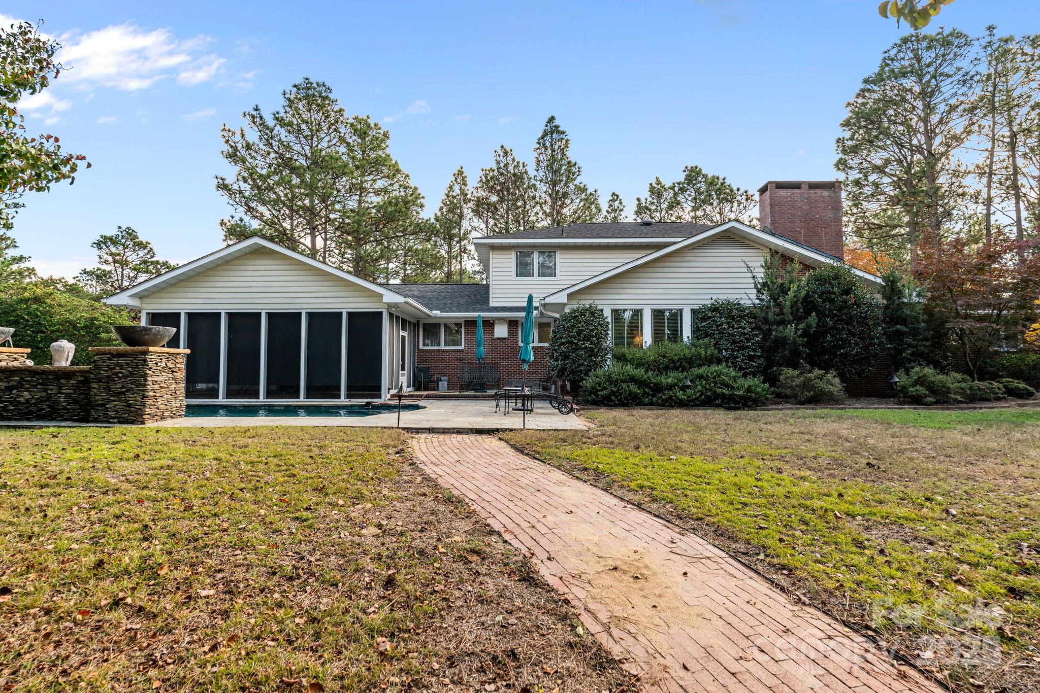 2000 Airport Road Carthage, NC 28327 - Photo 10 of 45 a front view of a house with a yard