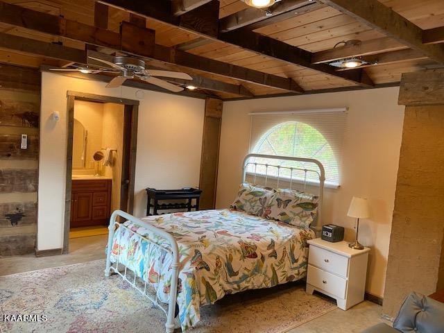 217 Jones Cove Road Cosby, TN 37722 - Photo 29 of 48 a bedroom with a bed and a mirror