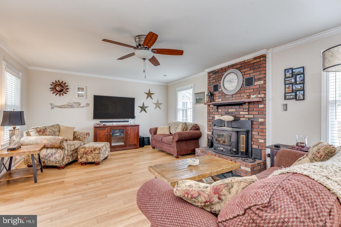 418 Apple Road Edgewater Park, NJ 08010 - Photo 10 of 39 Light filled living/family room with fireplace