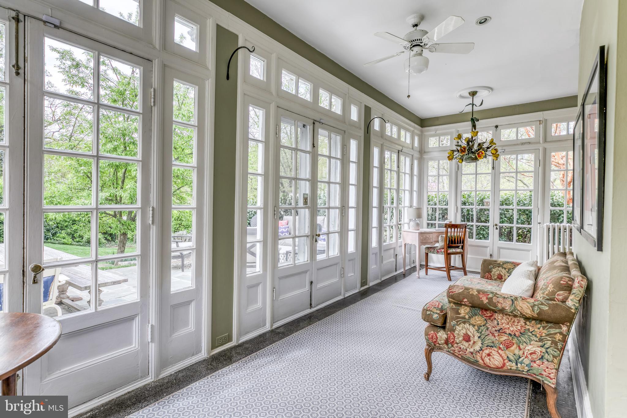 5215 Springlake Way Baltimore, MD 21212 - Photo 21 of 61 Sunroom with walls of windows
