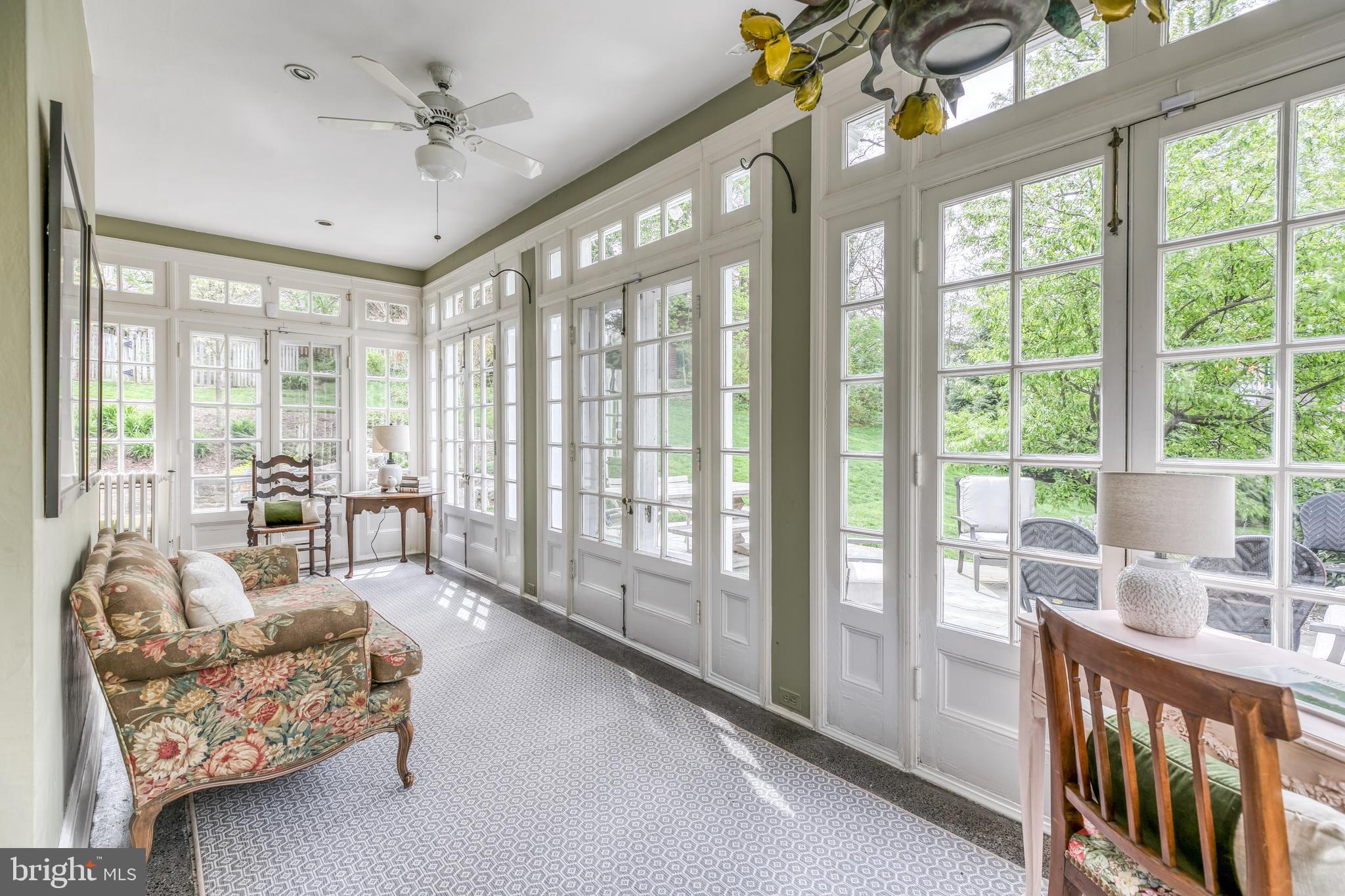 5215 Springlake Way Baltimore, MD 21212 - Photo 22 of 61 Sunroom opens to expansive patio