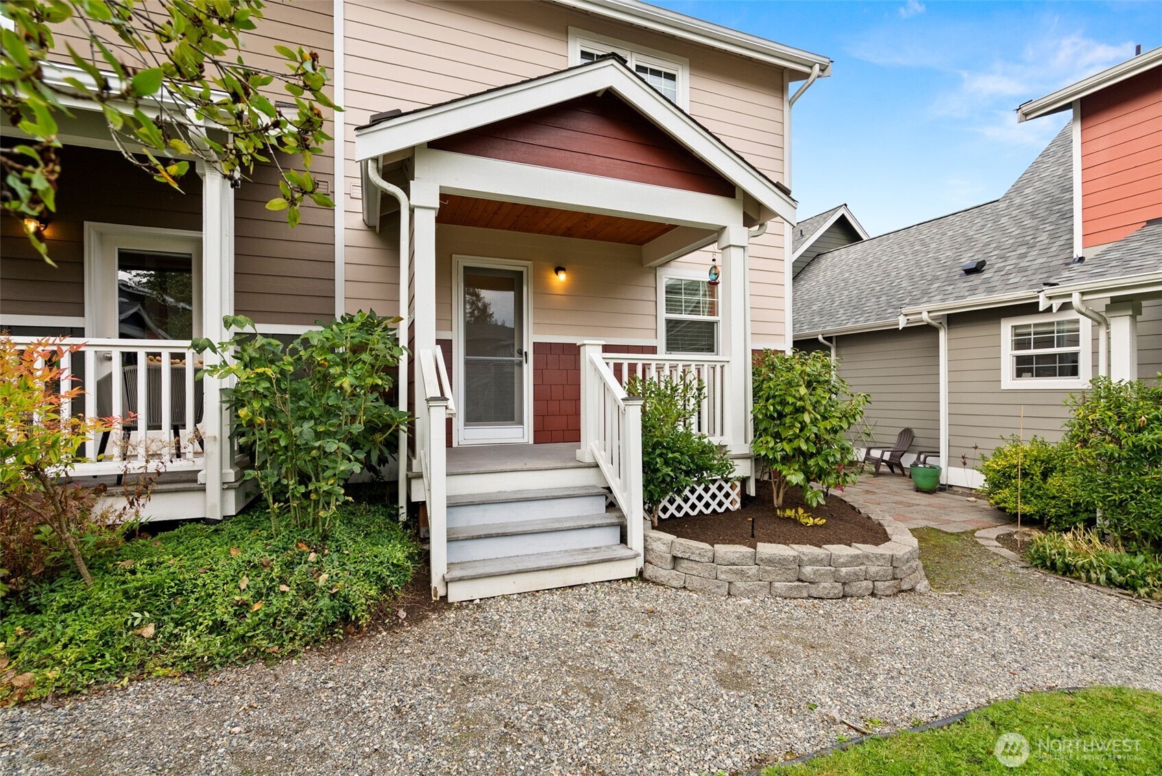 1322 Polly's Lane Bainbridge Island, WA 98110 - Photo 21 of 29 a view of a house with a small yard plants and large tree
