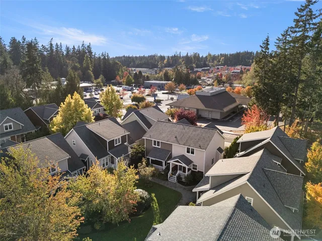 an aerial view of a house with a garden