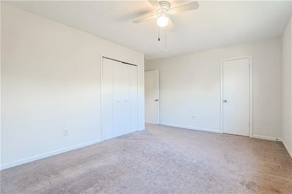 a bathroom with a sink toilet and vanity