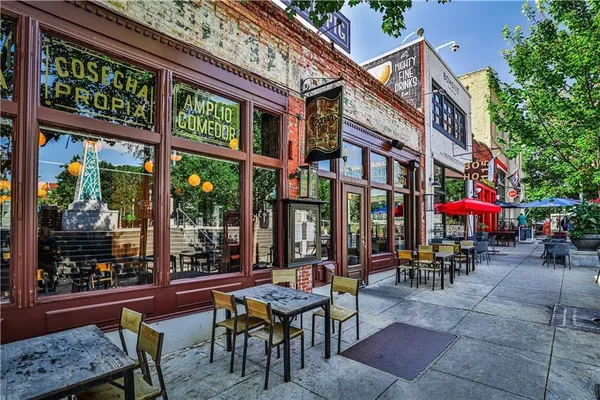 a view of street with shops