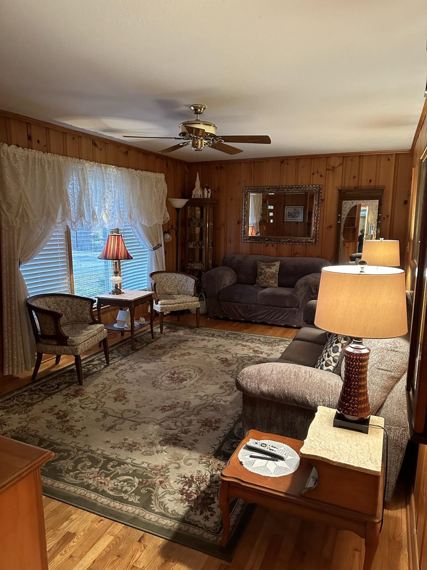 1036 Mill Creek Road Troy, TN 38260 - Photo 2 of 17 a living room with furniture and a chandelier