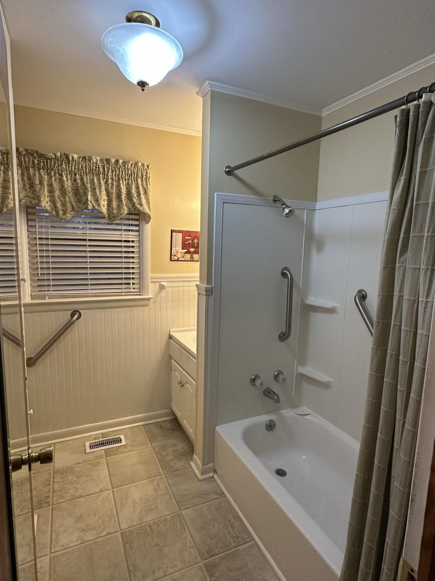 1036 Mill Creek Road Troy, TN 38260 - Photo 7 of 17 a bathroom with a tub a sink a mirror and a shower