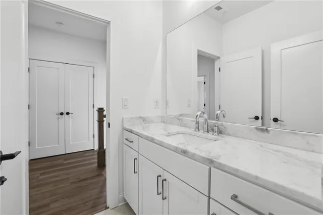 a view of a room with wooden walls