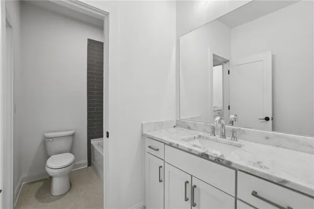 a view of a chair and table in the garden