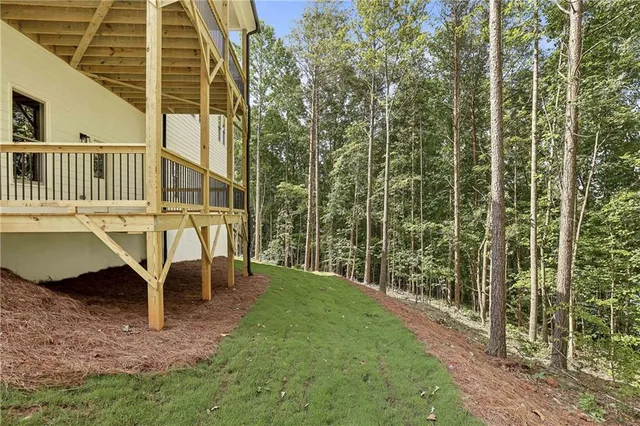 a view of a lake with outdoor space and a lake view