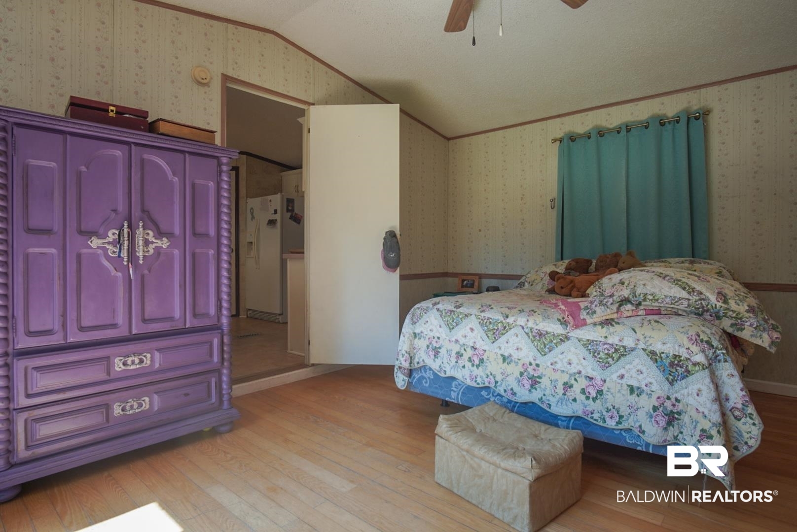 9190 County Road 97 Elberta, AL 36530 - Photo 27 of 53 Bedroom with light hardwood / wood-style floors, white refrigerator with ice dispenser, a textured ceiling, lofted ceiling, and ceiling fan