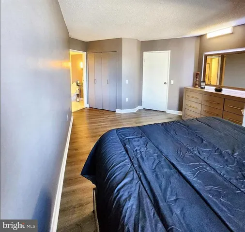 a view of a living room and hardwood floor