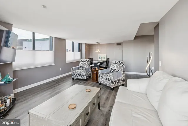 a bed room with two bed and a window