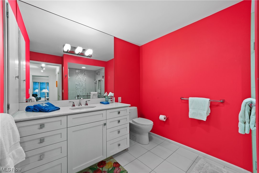 3845 Lander Road, Unit 2 Chagrin Falls, OH 44022 - Photo 14 of 31 Bathroom with toilet, oversized vanity, and tile flooring