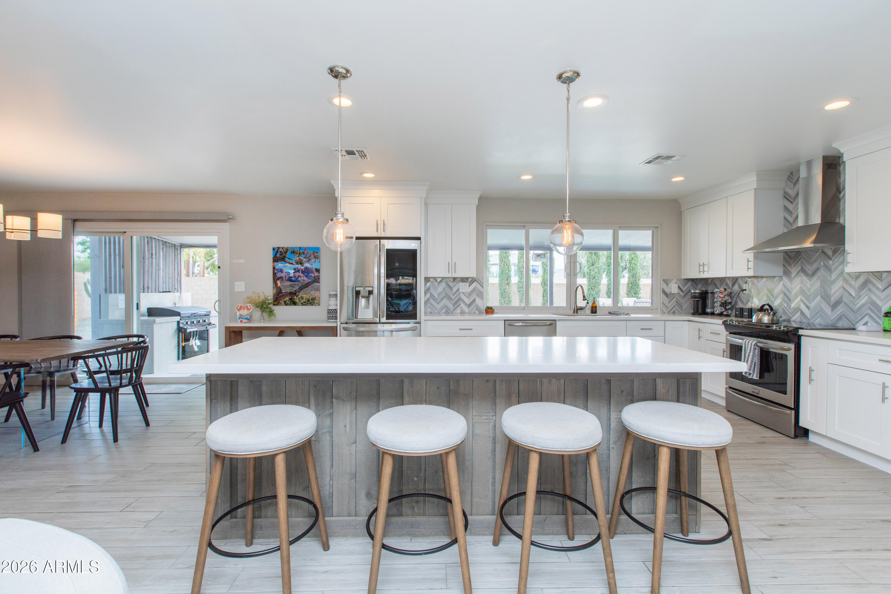 5541 East Cheery Lynn Road Phoenix, AZ 85018 - Photo 15 of 69 a large kitchen with a table and chairs