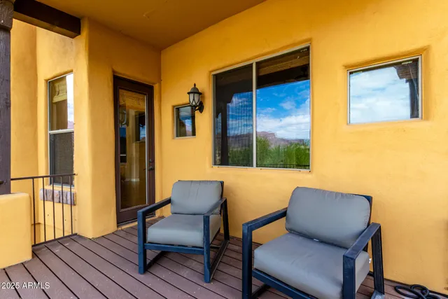 a blue chair sitting in front of a door