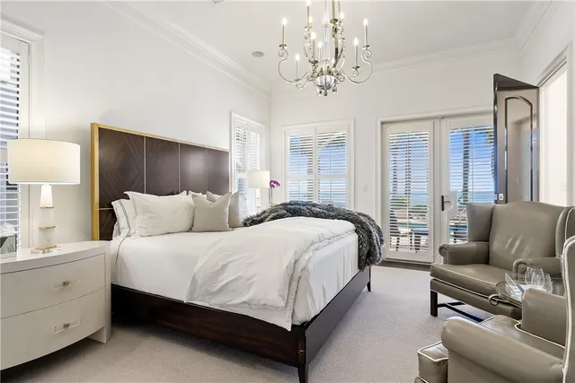 a bedroom with bed and a couch