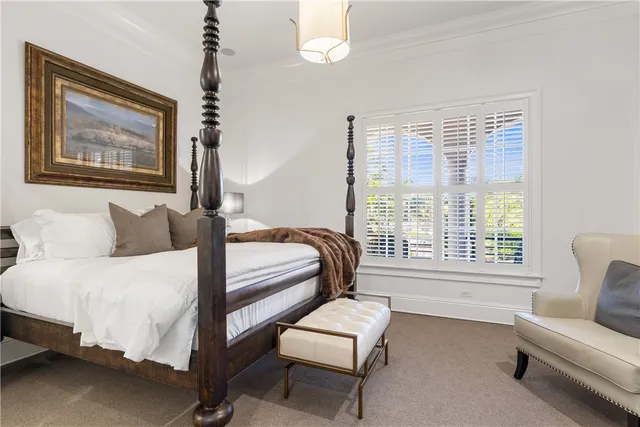 a view of a house with backyard and swimming pool