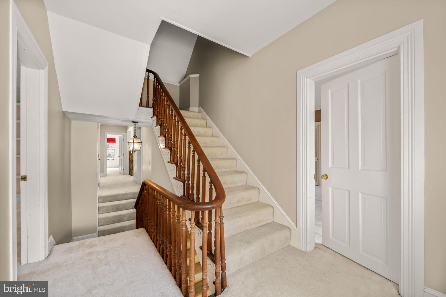 28923 Island Creek Road Trappe, MD 21673 - Photo 48 of 95 Upstairs Hall and steps leading to third floor