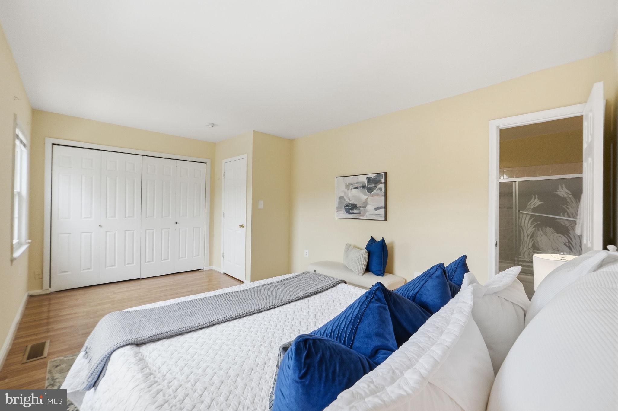 6470 Franconia Court Springfield, VA 22150 - Photo 12 of 31 a bedroom with a large bed and a window