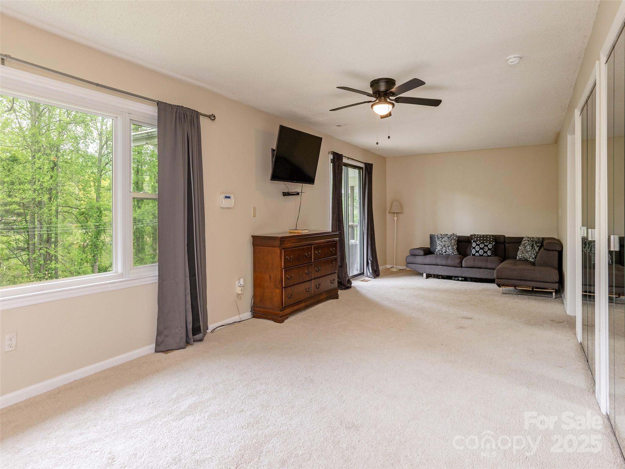 61 West Lake View Road Hendersonville, NC 28739 - Photo 20 of 37 a living room with furniture and a window