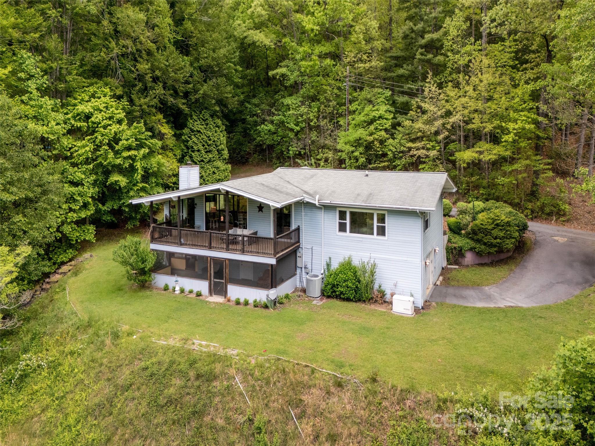 61 West Lake View Road Hendersonville, NC 28739 - Photo 36 of 37 an aerial view of a house with swimming pool garden view and trees
