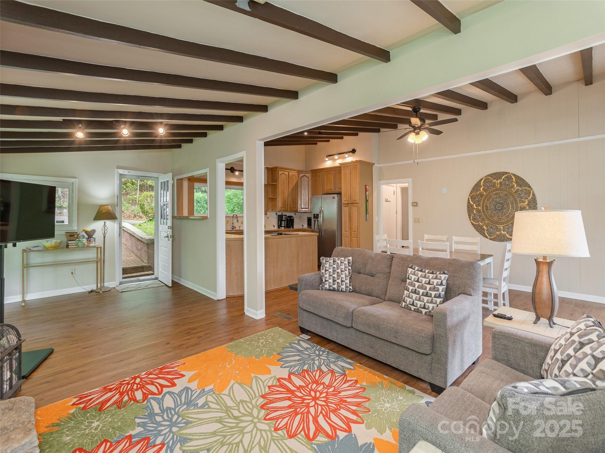 61 West Lake View Road Hendersonville, NC 28739 - Photo 7 of 37 a living room with furniture and wooden floor