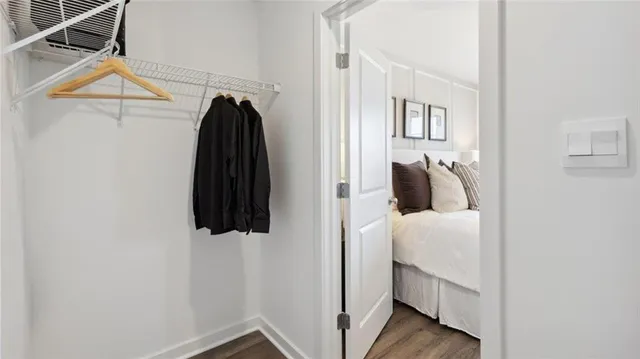 a room that has a bed and a closet in it