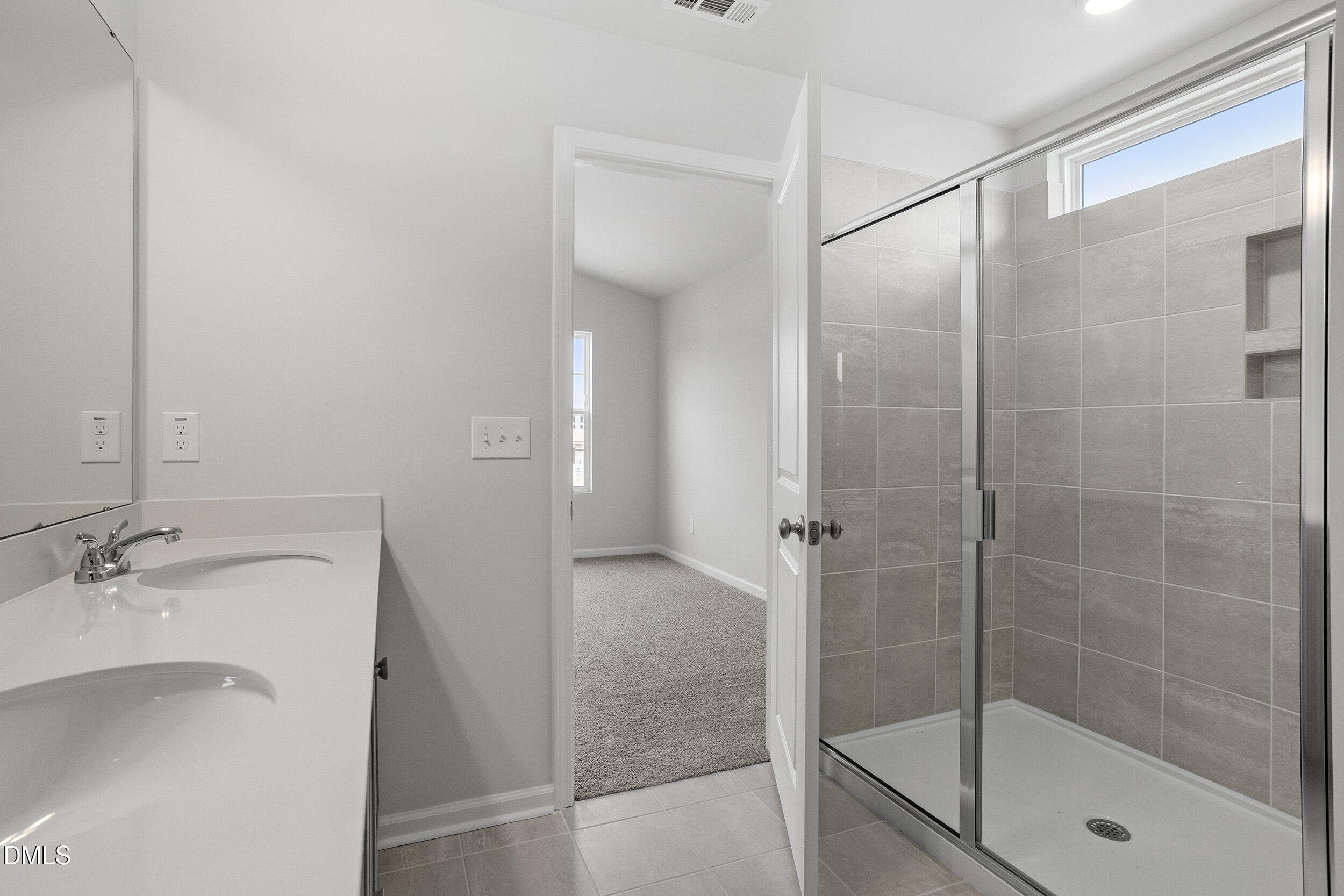 79 Osgood Street Angier, NC 27501 - Photo 22 of 31 a bathroom with a shower and a sink