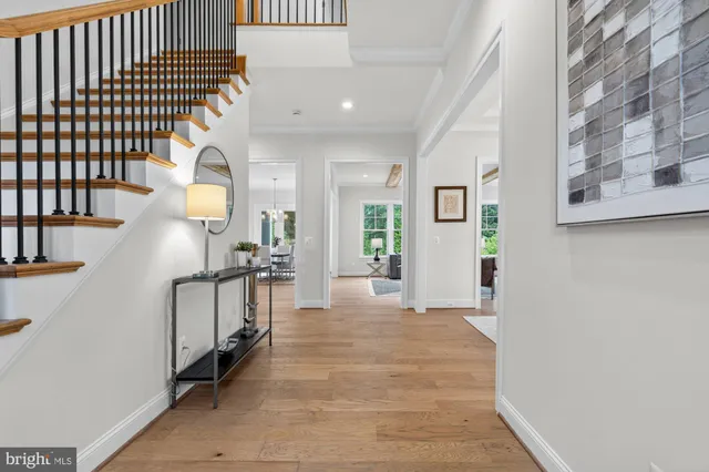a view of a livingroom with furniture and stairs
