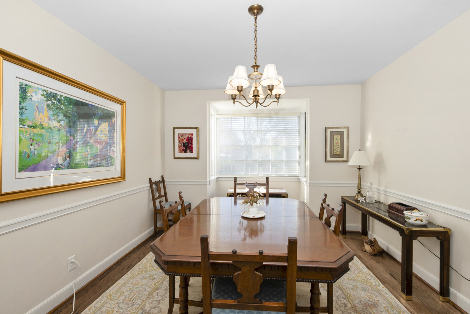 802 Argyle Avenue Flossmoor, IL 60422 - Photo 5 of 15 a view of a dining room with furniture a chandelier and wooden floor