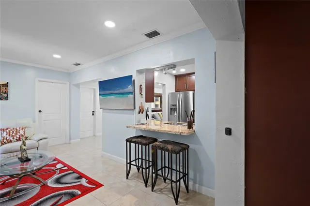 a view of a kitchen and dining room