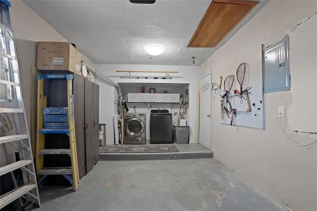 a view of a livingroom with an empty space and a fireplace