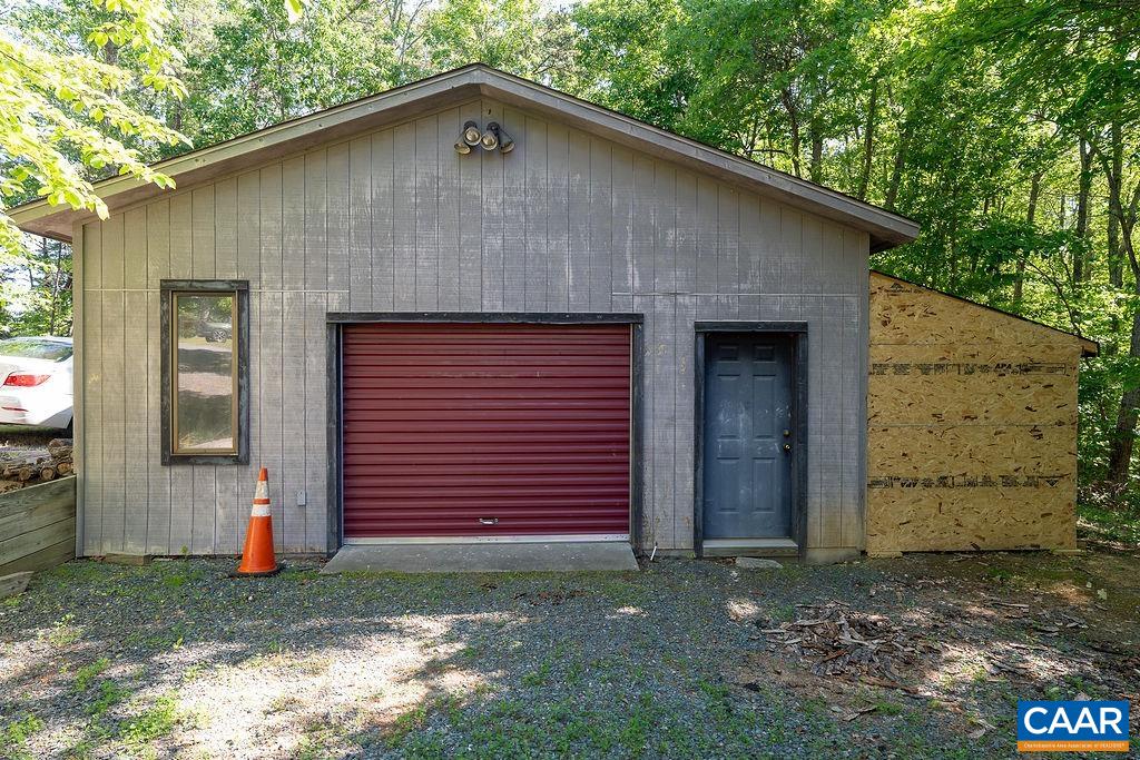 2851 Martin Kings Road Scottsville, VA 24590 - Photo 60 of 67 a front view of a house with a yard