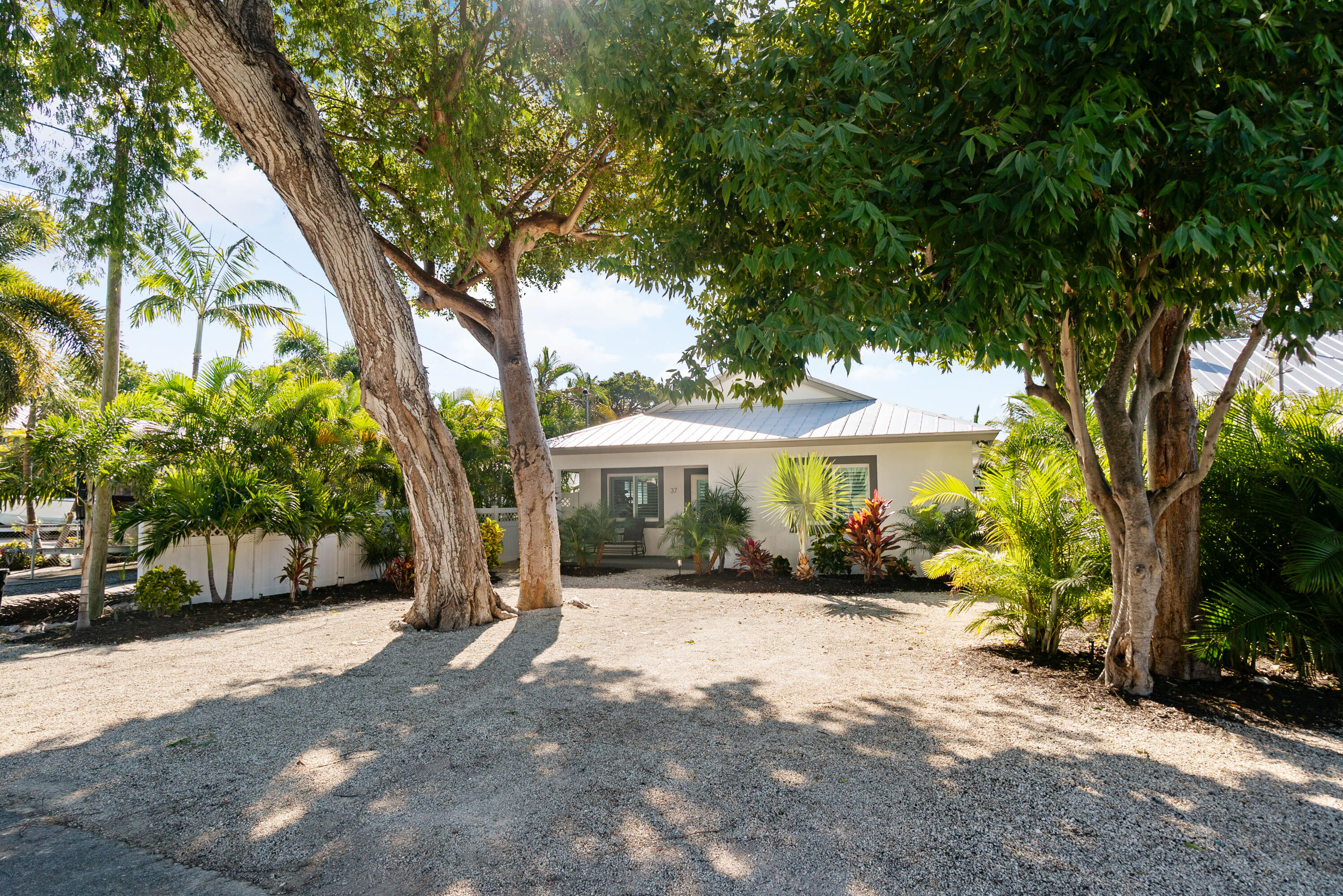 37 Bonefish Avenue Key Largo, FL 33037 - Photo 14 of 22 a view of a house with a yard