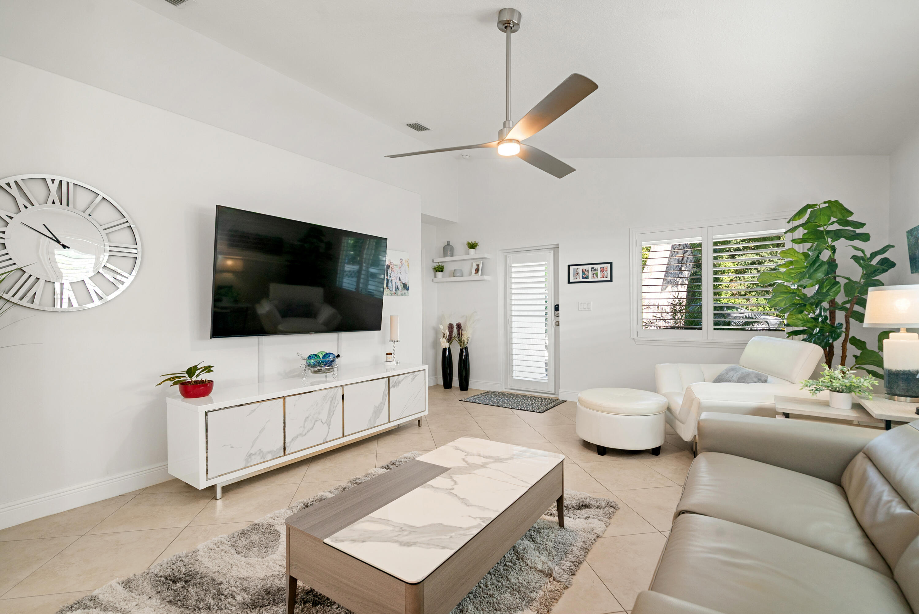 37 Bonefish Avenue Key Largo, FL 33037 - Photo 15 of 22 a living room with furniture and a flat screen tv