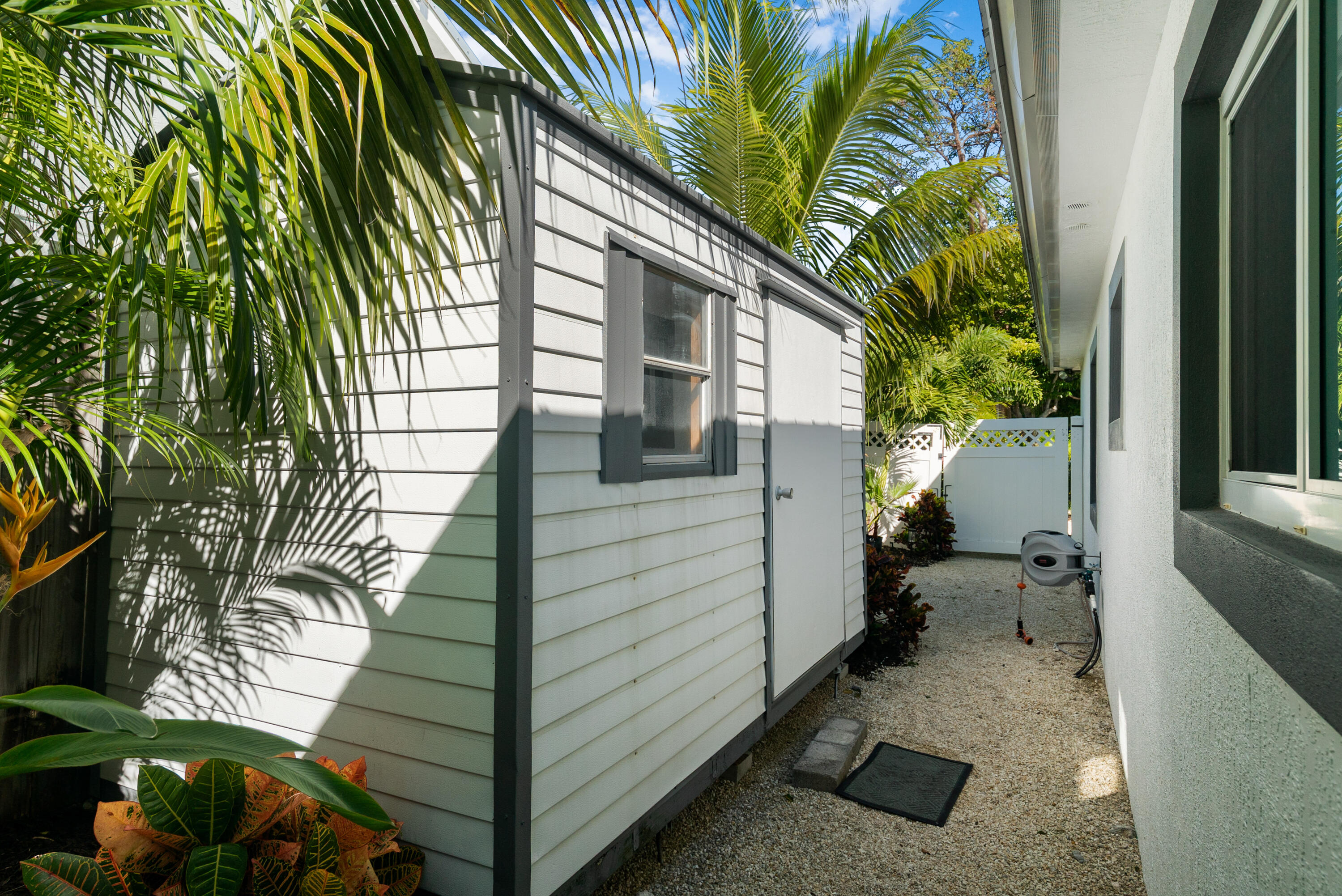 37 Bonefish Avenue Key Largo, FL 33037 - Photo 18 of 22 a view of a house with a backyard