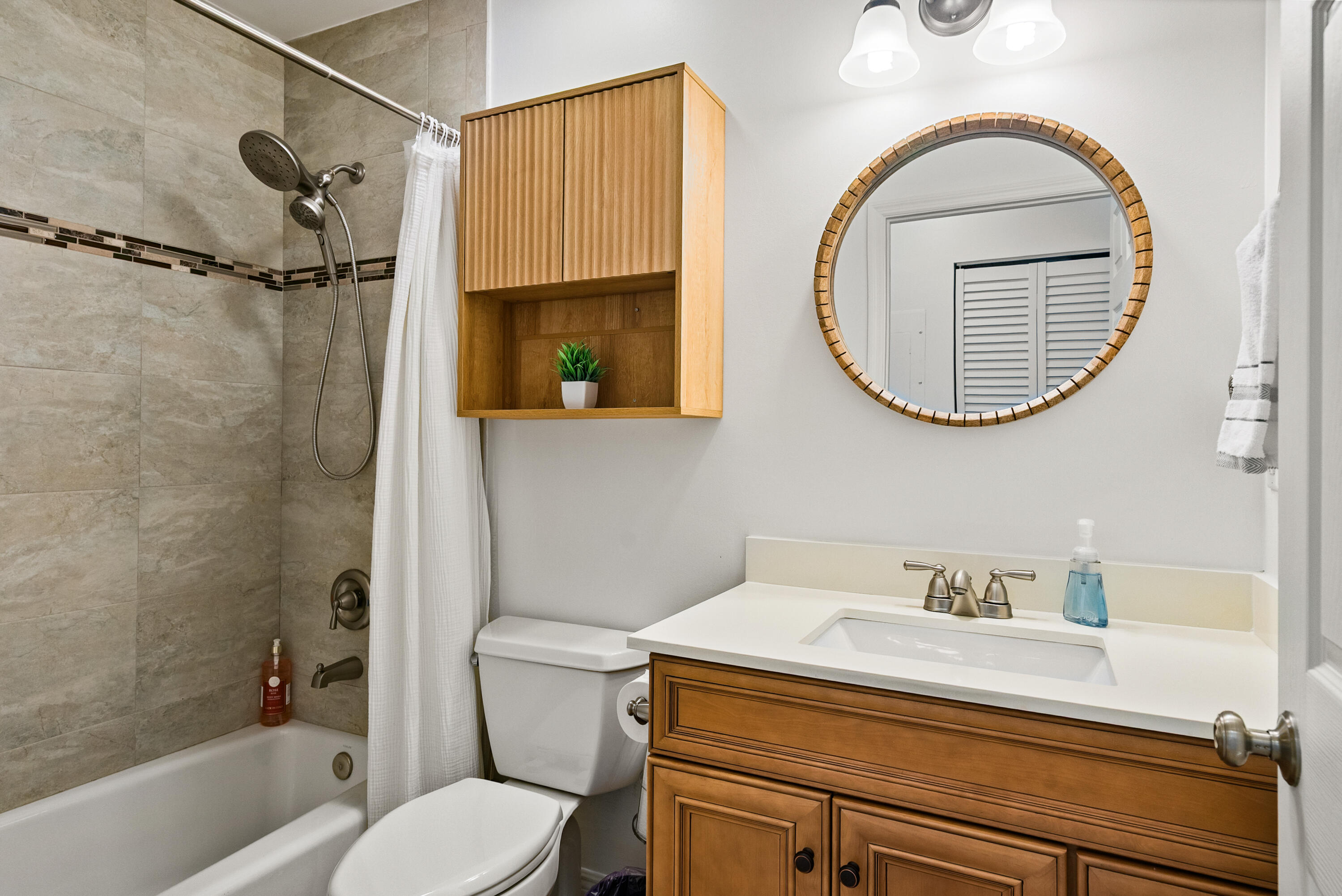 37 Bonefish Avenue Key Largo, FL 33037 - Photo 4 of 22 a bathroom with a sink a toilet and a mirror