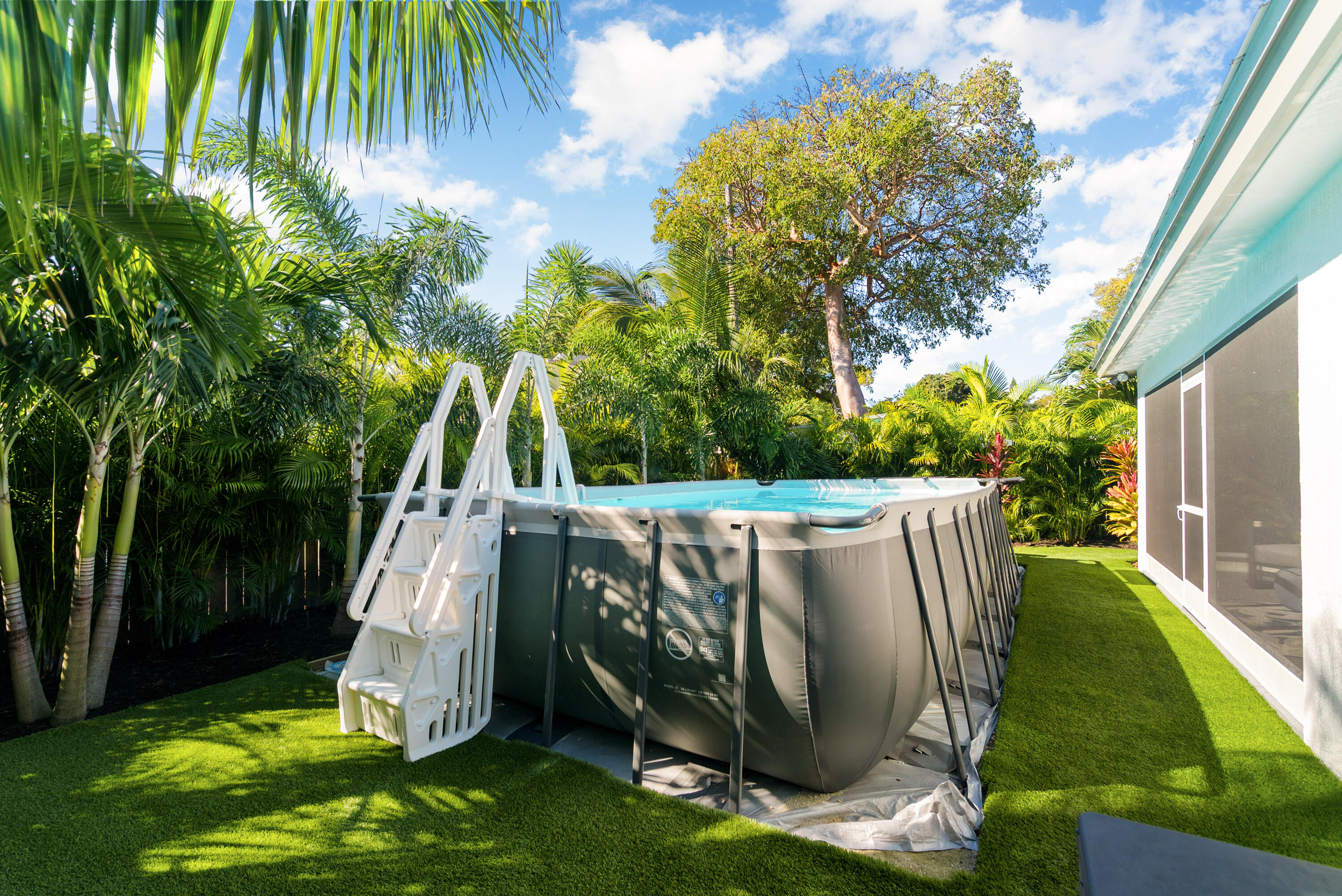 37 Bonefish Avenue Key Largo, FL 33037 - Photo 6 of 22 a view of a garden with a slide
