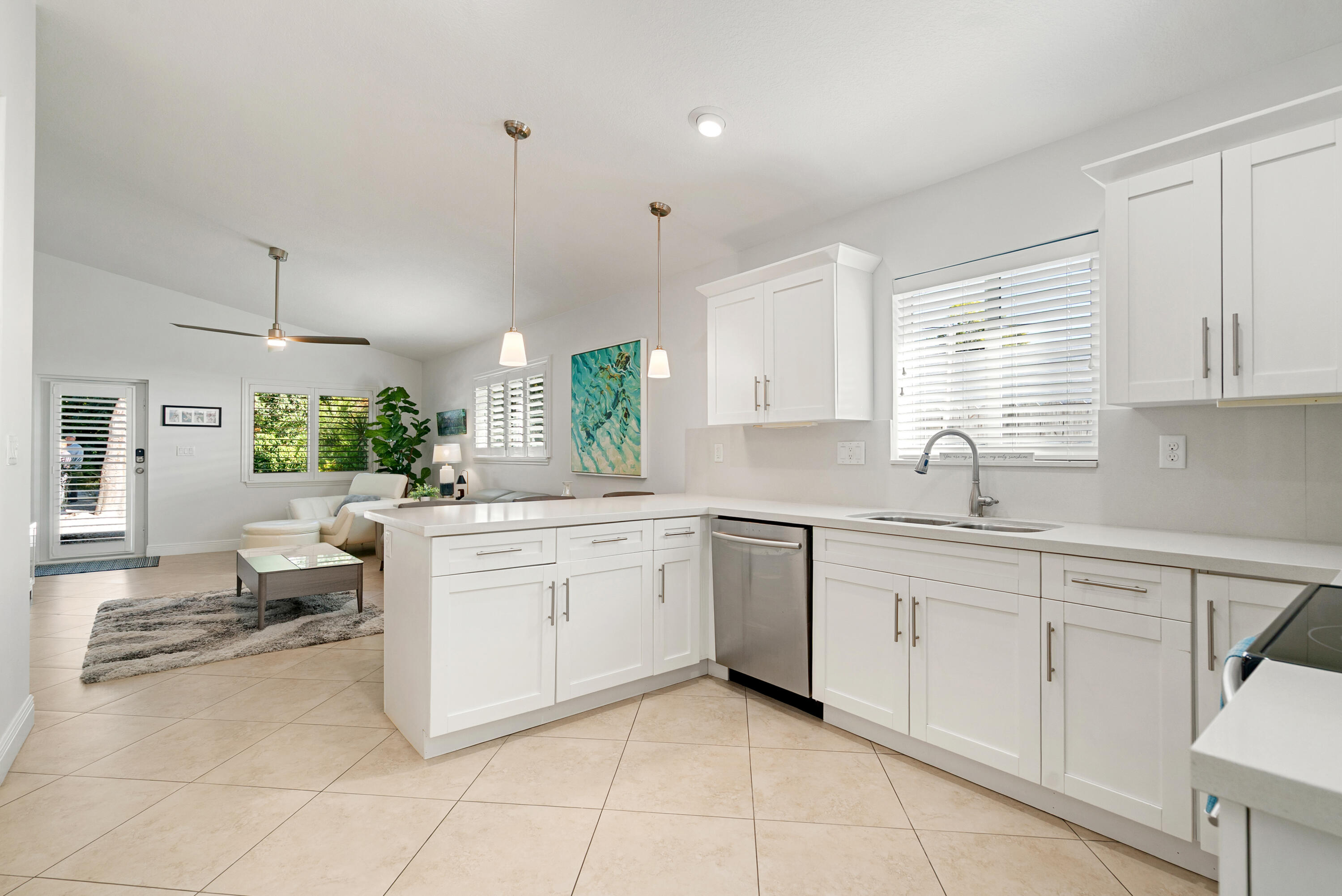 37 Bonefish Avenue Key Largo, FL 33037 - Photo 6 of 22 a kitchen with a sink and cabinets