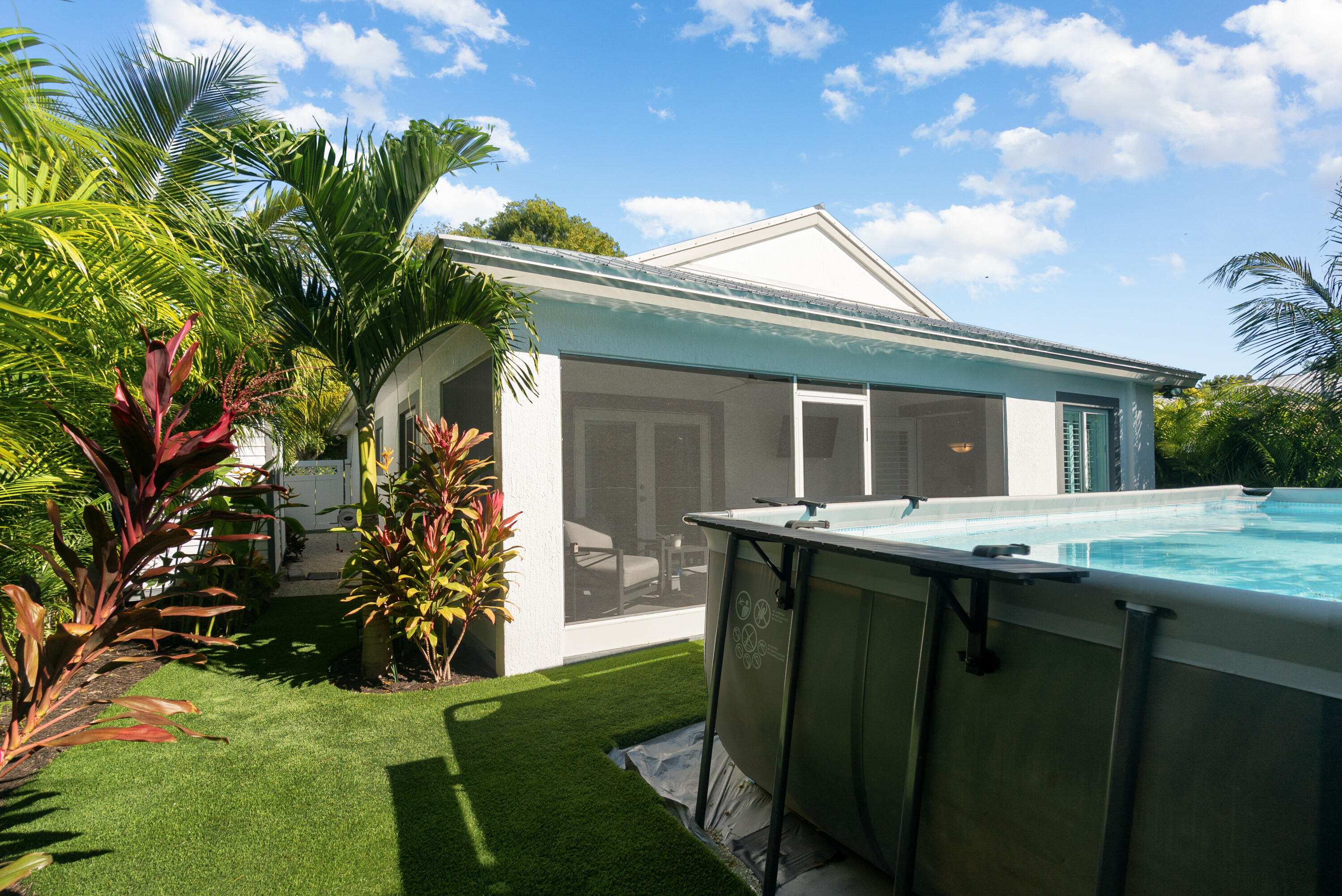 37 Bonefish Avenue Key Largo, FL 33037 - Photo 7 of 22 a view of a house with a backyard