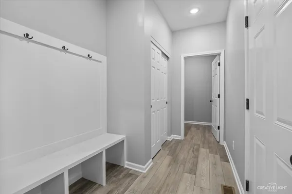 a view of a room with racks on the wall