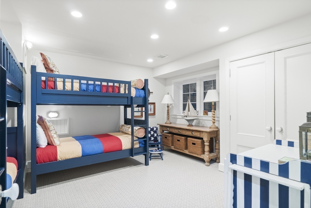 63 Baxter Road Nantucket, MA 02554 - Photo 20 of 21 a bedroom with furniture and a large window