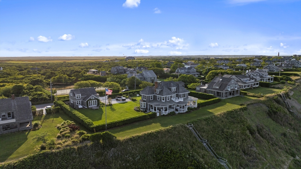 63 Baxter Road Nantucket, MA 02554 - Photo 3 of 21 an aerial view of a house with a garden view